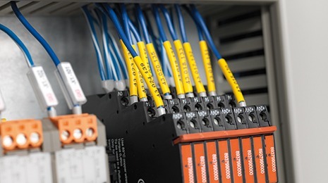 Terminal block wired with heat-shrinkable tubing.
