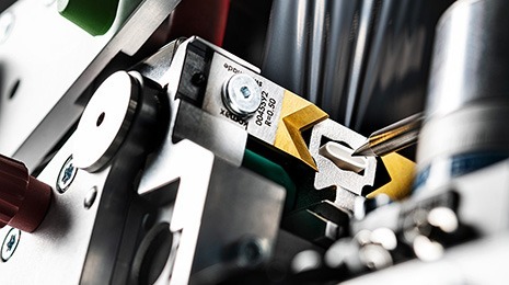 The wire tube is cut and then placed on a mandrel.